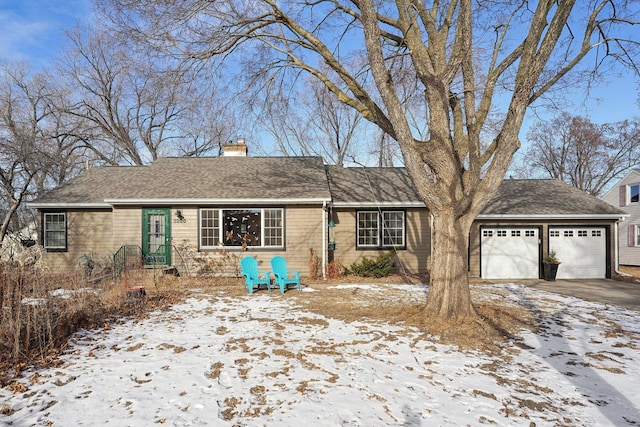 single story home featuring a garage