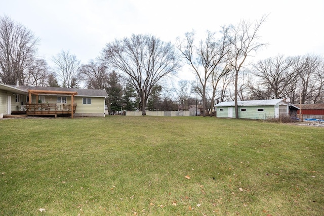 view of yard with a wooden deck