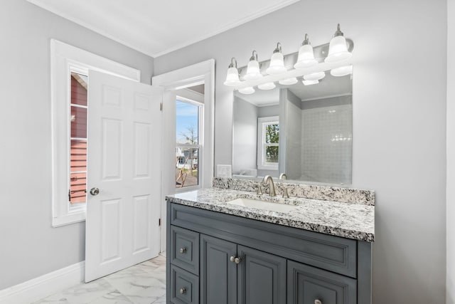 bathroom with vanity and ornamental molding