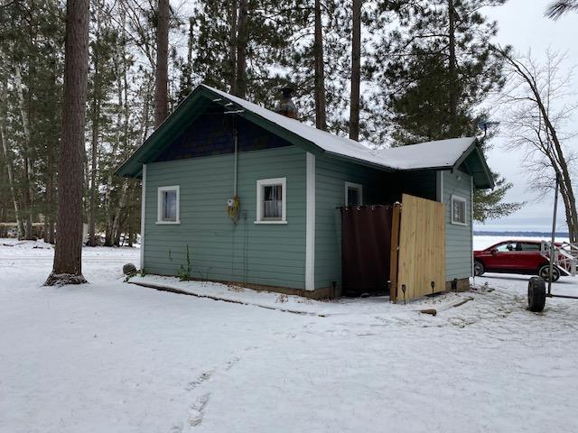 view of snow covered property