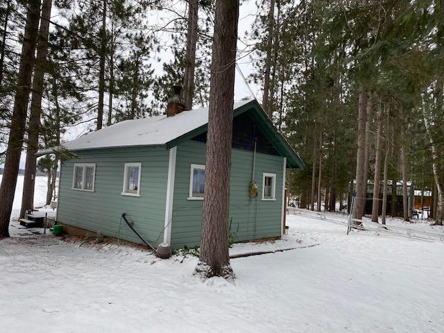 view of snow covered property