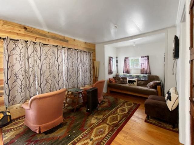 sitting room featuring wood-type flooring