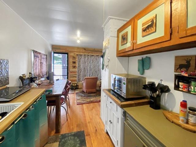 kitchen with light hardwood / wood-style flooring