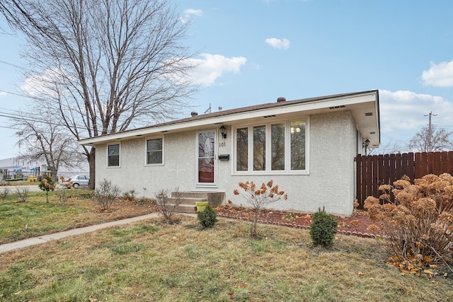 view of front of house with a front lawn