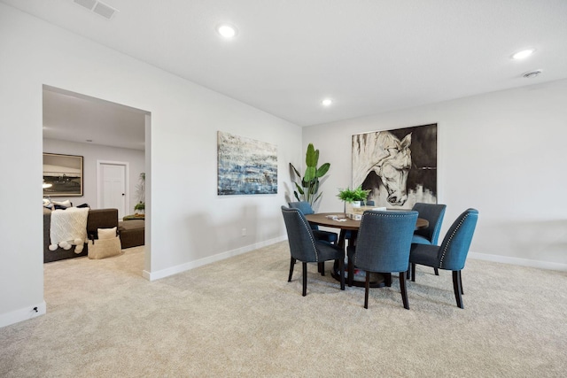 view of carpeted dining room