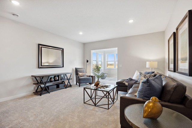 living room featuring light colored carpet