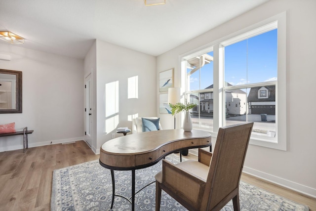 dining room featuring light hardwood / wood-style floors