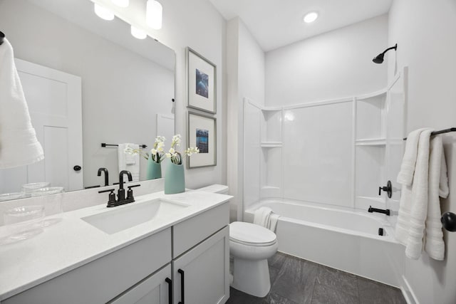 full bathroom with vanity, toilet, and shower / washtub combination