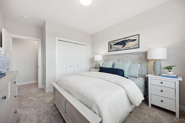 carpeted bedroom with a closet