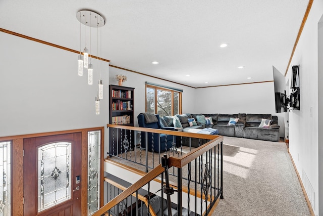 living room featuring crown molding and carpet