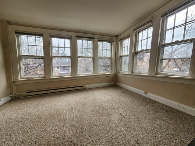 unfurnished sunroom with a baseboard radiator