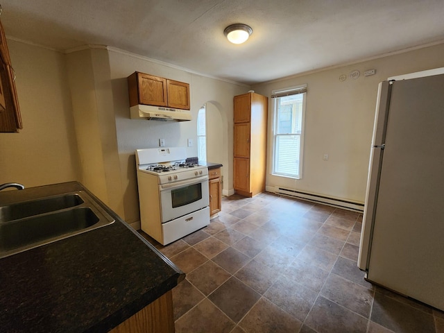 kitchen featuring white appliances, a baseboard radiator, crown molding, and sink