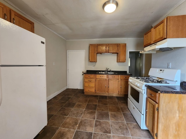 kitchen with sink and white appliances