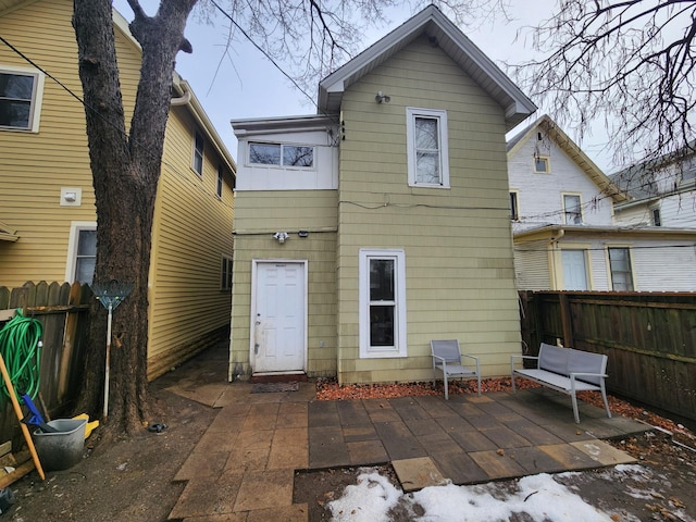 back of house with a patio area