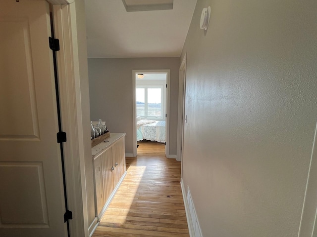 hall featuring light hardwood / wood-style floors