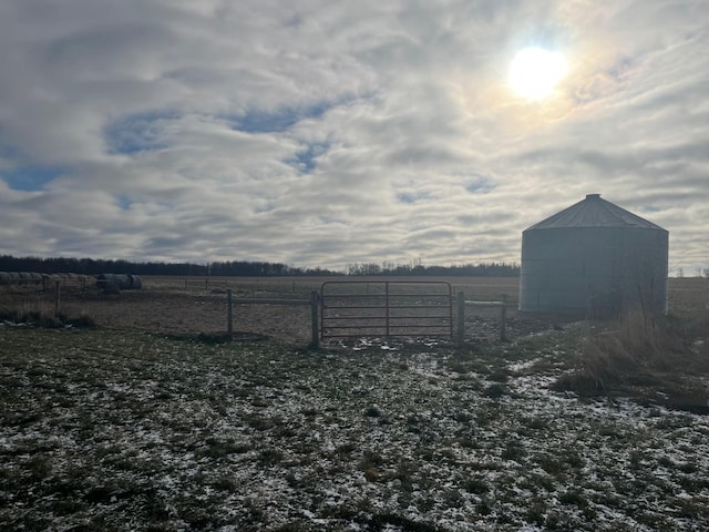 view of yard with a rural view