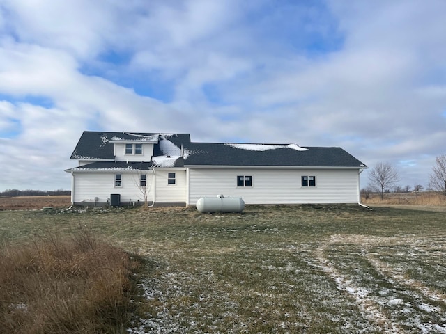 back of house featuring central air condition unit