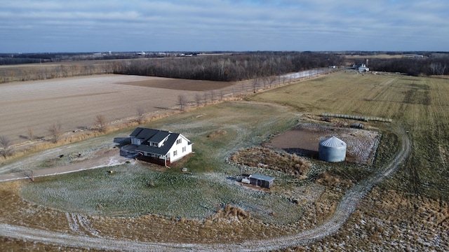 birds eye view of property featuring a rural view