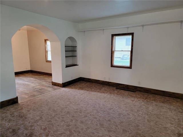 empty room featuring carpet floors