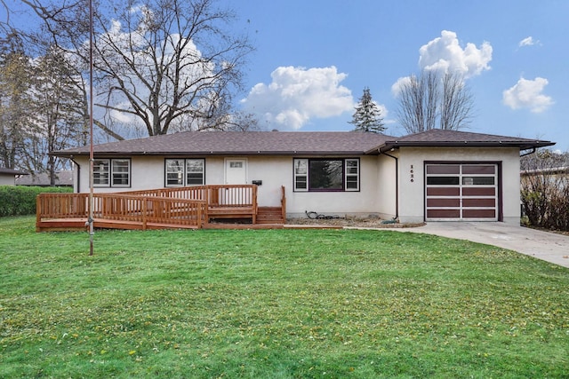 ranch-style home featuring a garage, a deck, and a front lawn