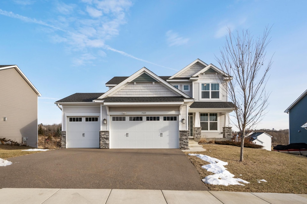 craftsman inspired home featuring a garage