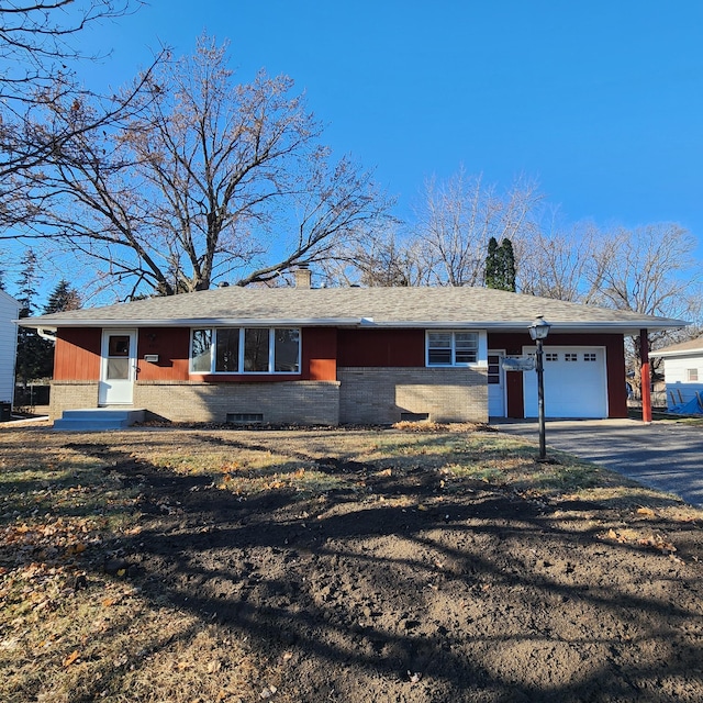 ranch-style house with a garage