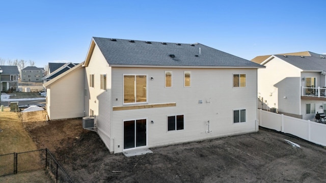 back of property featuring cooling unit