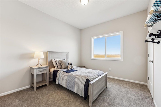 bedroom featuring light carpet