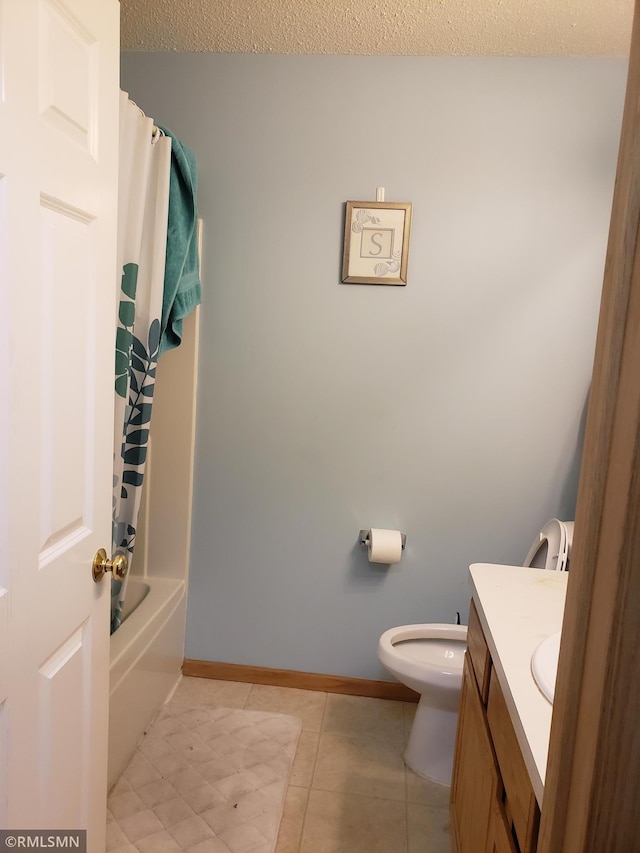 full bathroom featuring shower / bathtub combination with curtain, tile patterned flooring, a textured ceiling, toilet, and vanity