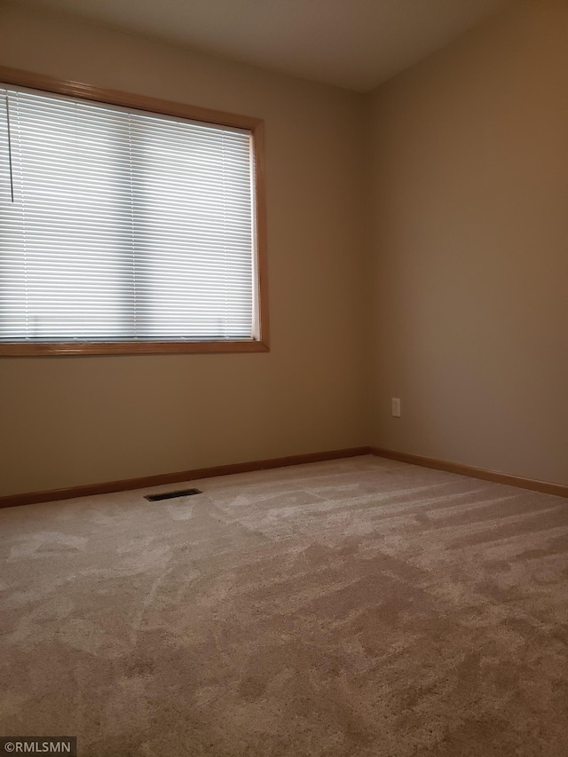 view of carpeted spare room