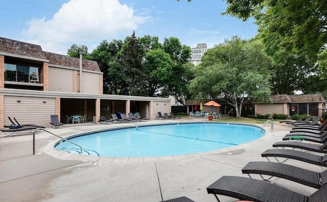 pool featuring a patio area