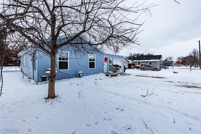 exterior space featuring a garage