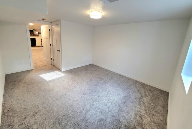 empty room featuring light colored carpet