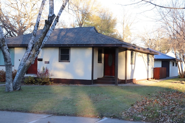 view of front of home with a front lawn