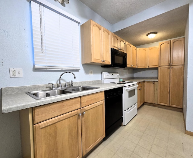 kitchen with sink, black appliances, and a textured ceiling