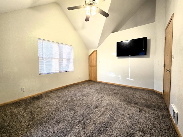 unfurnished living room with carpet floors, vaulted ceiling, and ceiling fan