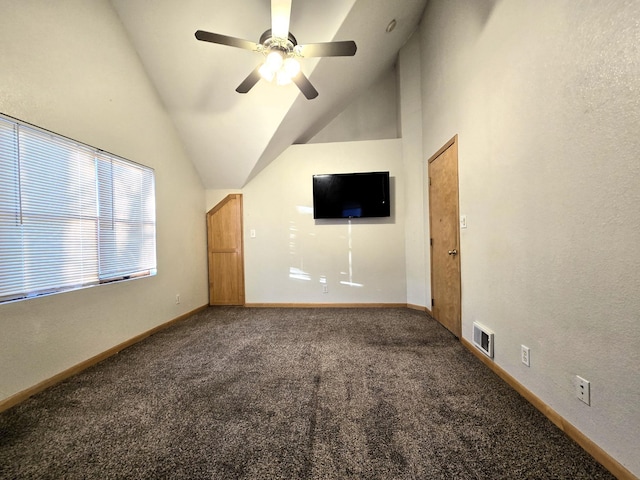 unfurnished living room featuring carpet flooring, ceiling fan, and high vaulted ceiling