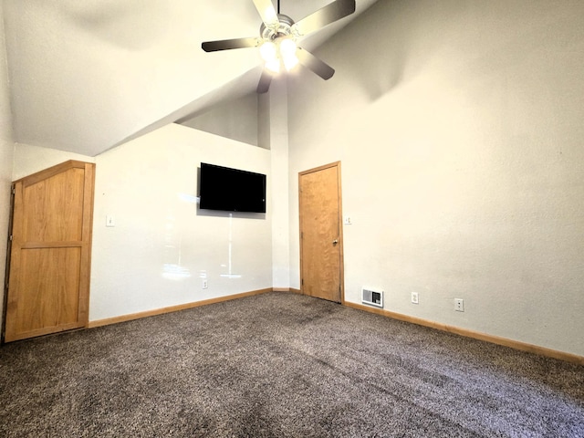 interior space featuring ceiling fan and vaulted ceiling