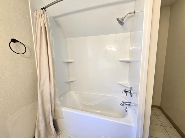 bathroom with tile patterned flooring and shower / bath combination with curtain