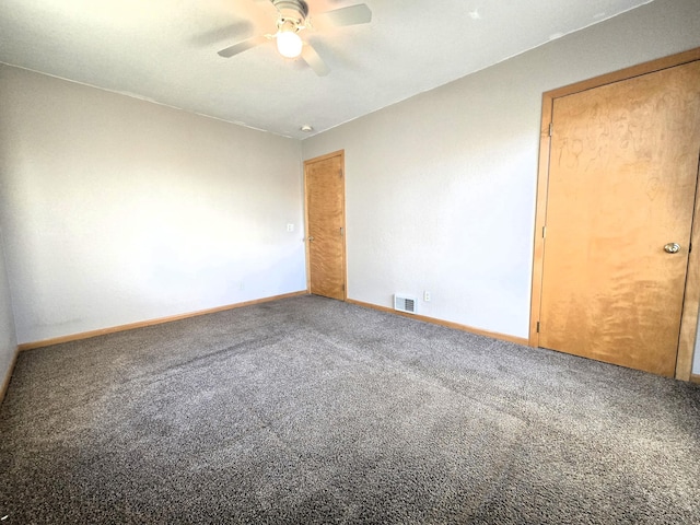 empty room with carpet flooring and ceiling fan