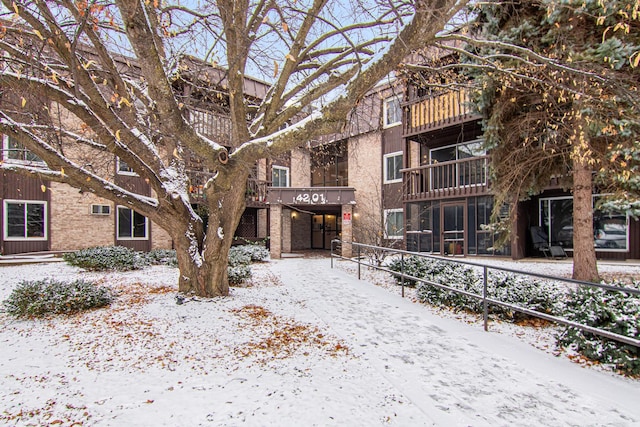 view of snow covered property