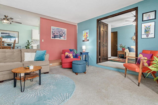 living room with carpet and ceiling fan