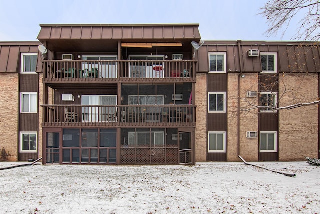 view of snow covered property