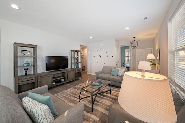 living room featuring dark hardwood / wood-style flooring