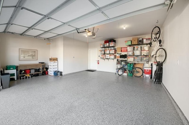 garage featuring a garage door opener