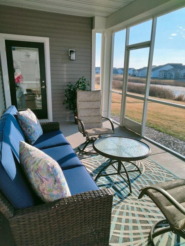 sunroom / solarium featuring a wealth of natural light