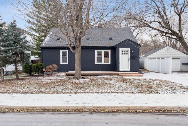 view of front of home with an outbuilding and a garage