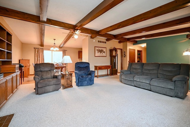 carpeted living room with beamed ceiling and ceiling fan