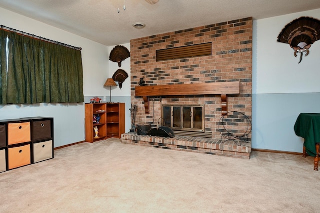 carpeted living room with a textured ceiling and a brick fireplace