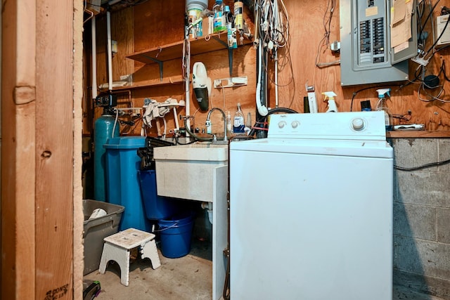 utility room featuring washer / dryer and electric panel